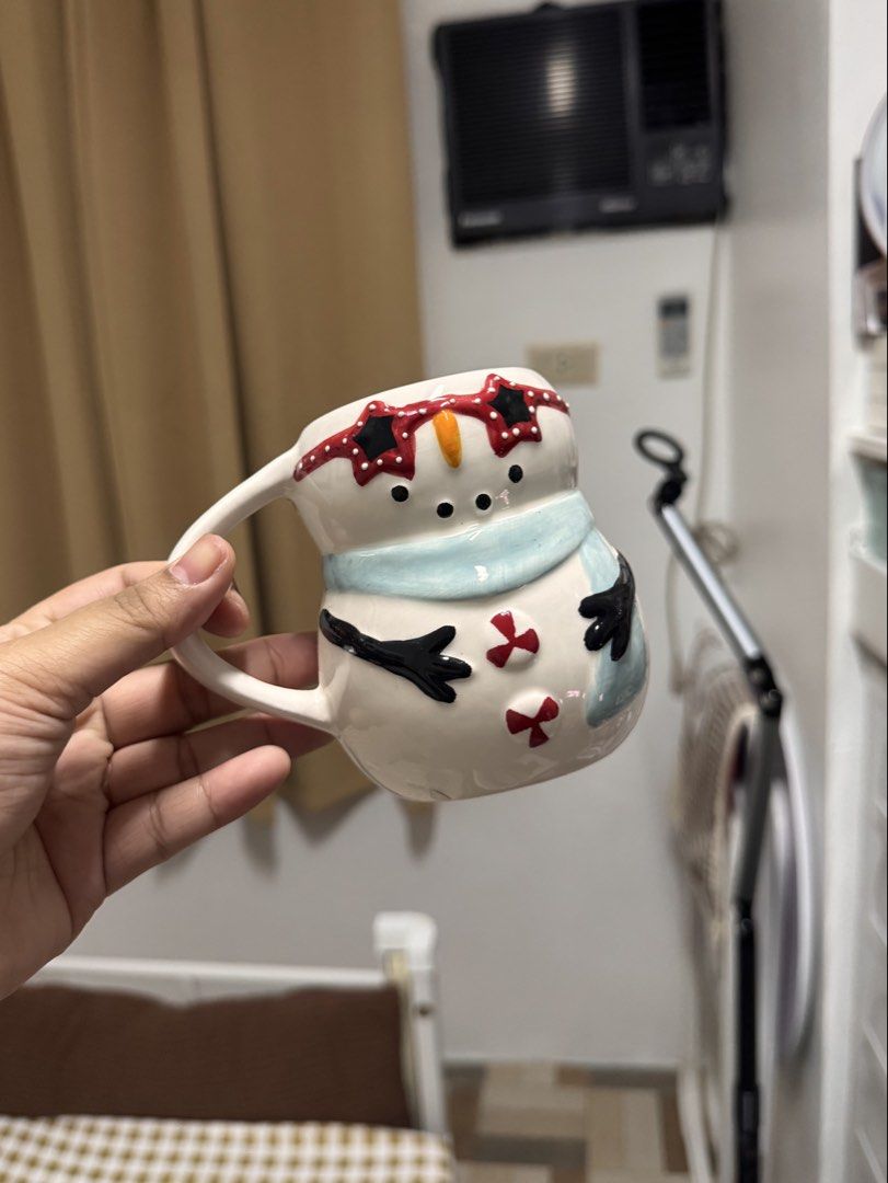 Ceramic Boutique Home Snowman Mug (Category: Coffee & Tea Tableware) located in Calamba. Submitted by keemi_ (Listing ID 1461738649, Image 1). Description: - ₱250 - Ceramic snowman mug from Boutique Home - Perfect for the holiday season or as a unique gift - Perfect for Christmas Decor.