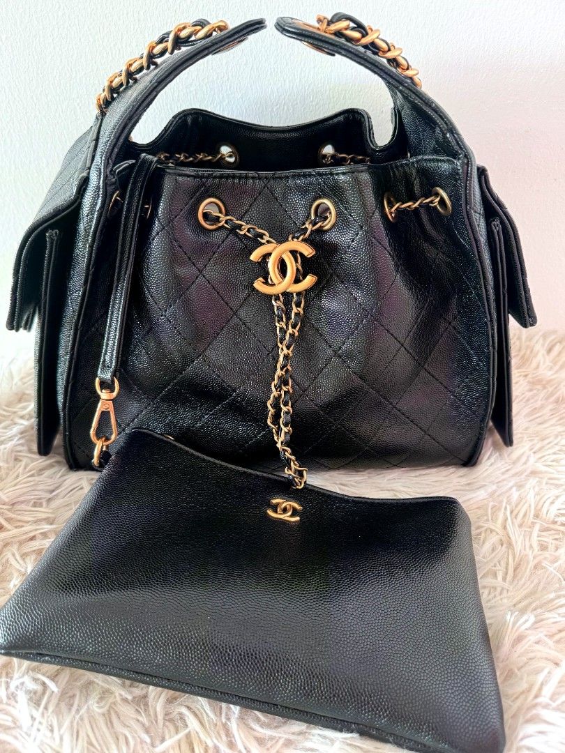 Chanel 25 hobo bag (Category: Shoulder Bags) located in Caloocan City. Submitted by mylove326 (Listing ID 1461603380, Image 1). Description: - Chanel 25 black quilted leather bucket bag - Features a drawstring closure with gold chain detail - Interior: 1 zip pocket, 1 slip pocket - Comes with authenticity card and serial number sticker - Gold hardware throughout - Perfect for everyday or special occasions -pouch included -Size - small 26cm width,
