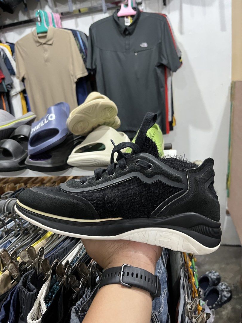 Chanel Black Furry Sneakers (Category: Sneakers) located in Tabuk. Submitted by collectors_thrift_shop (Listing ID 1461676642, Image 3). Description: - Authentic Chanel Sneakers - Color: Black - Size: 40 - Features: Furry details, iconic Chanel logo on the side - Origin: Made in Italy - Condition: Super comfy and stylish - Perfect for: Everyday wear or dressing up an outfit.