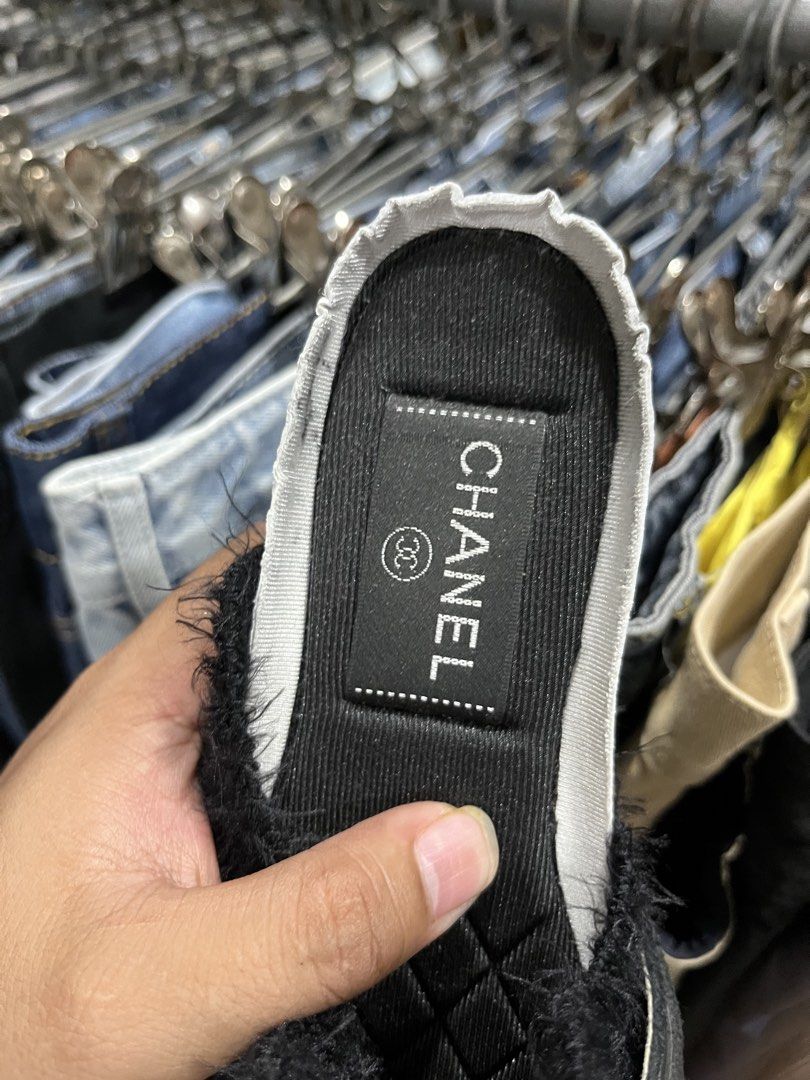 Chanel Black Furry Sneakers (Category: Sneakers) located in Tabuk. Submitted by collectors_thrift_shop (Listing ID 1461676642, Image 2). Description: - Authentic Chanel Sneakers - Color: Black - Size: 40 - Features: Furry details, iconic Chanel logo on the side - Origin: Made in Italy - Condition: Super comfy and stylish - Perfect for: Everyday wear or dressing up an outfit.