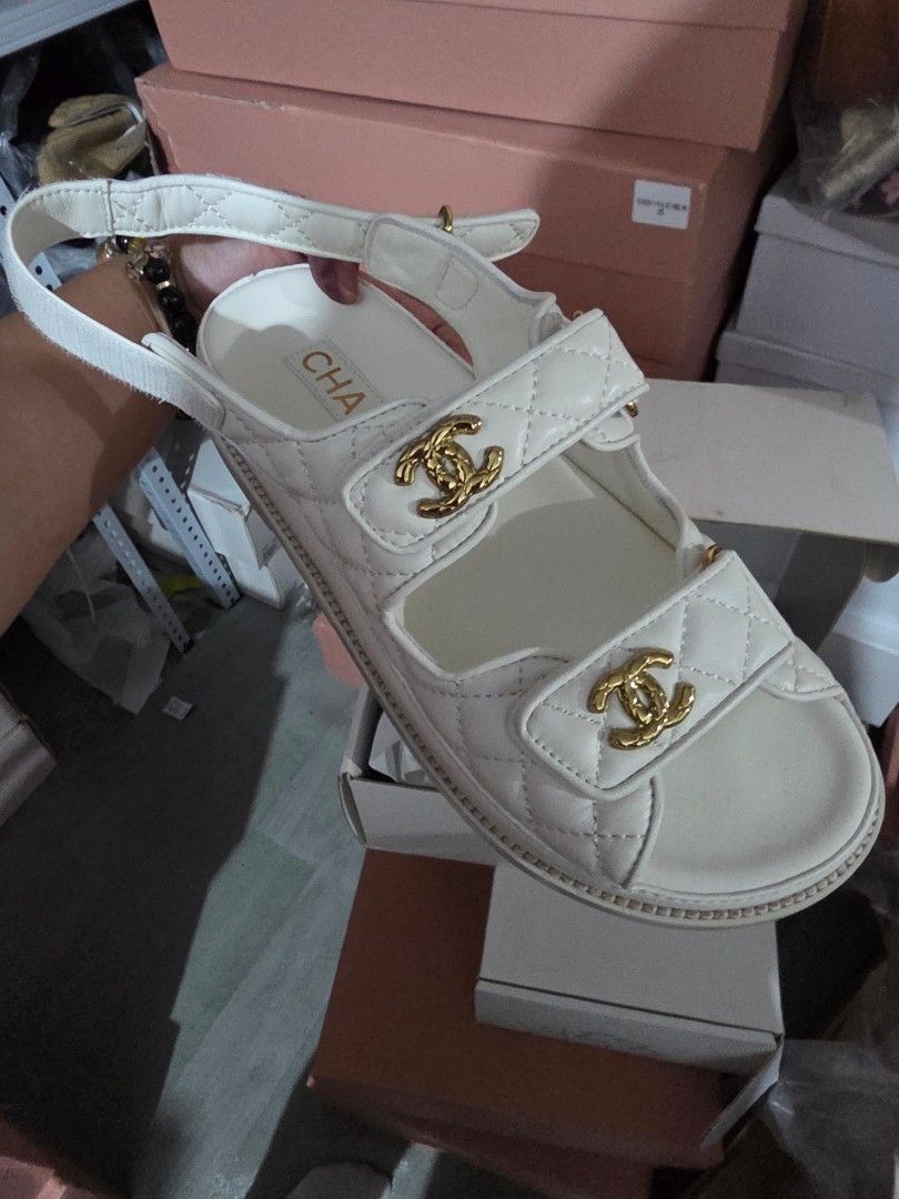 Chanel Dad Sandal White EU 36 (Category: Flats & Sandals) located in Dasmarinas. Submitted by velourvaulte (Listing ID 1461569027, Image 1). Description: chic and effortless everyday sandal in classic white caviar, featuring a comfortable chunky silhouette that pairs beautifully with both casual and elevated looks. ✨ Details: • Size: EU 36 • White caviar finish • Chunky dad sandal silhouette • Adjustable straps • Comfortable & versatile • Perfect