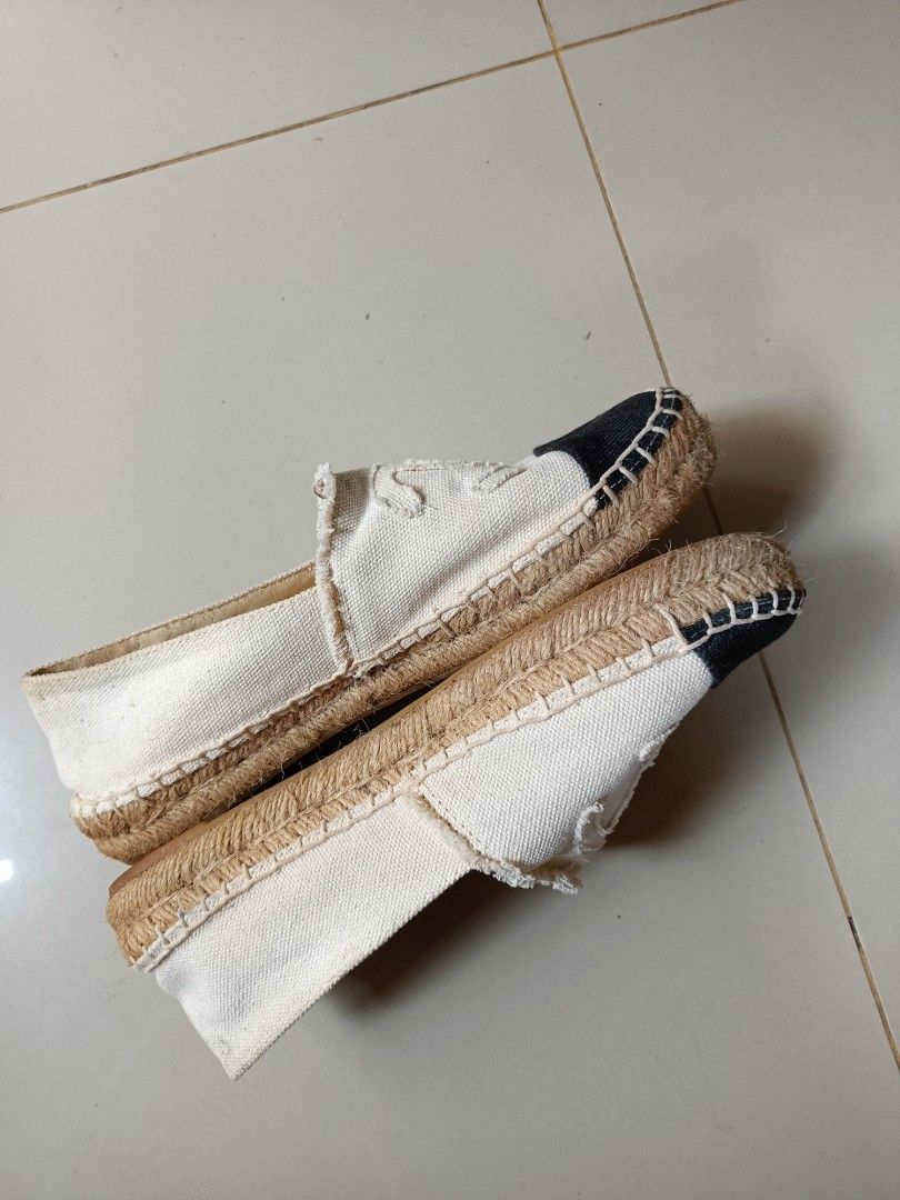 CHANEL Pre-Owned Interlocking CC Espadrilles (Category: Flats & Sandals) located in Manila. Submitted by pnjdianne25879 (Listing ID 1461576735, Image 3). Description: - Authentic Chanel espadrilles - Classic design with interlocking CC logo - Comfortable canvas upper - Durable jute sole - Made in Italy - Ideal for stylish casual wear.