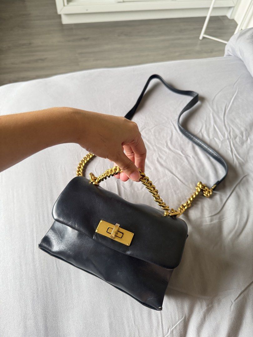 Charles & Keith Mini Kerry Crossbody Bag (Category: Cross-body Bags) located in Batangas. Submitted by vybxx (Listing ID 1461641857, Image 2). Description: - minimal crack on the sides but in good condition - ship via j&t + 90 sf nationwide .