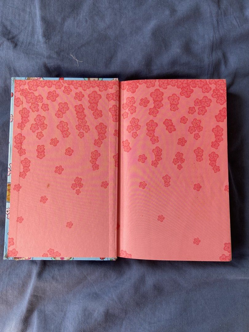 Cherry Crush Notebook with Chocolate and Cherry Design (Category: Stationery & School Supplies) located in Mandaluyong City. Submitted by coolmami (Listing ID 1461664049, Image 2). Description: - Cute 'Cherry Crush' themed notebook - Light blue cover with chocolate and cherry blossom design - Inside pages feature a pink floral pattern - Ideal for journaling, note-taking, or as a gift - Perfect for lovers of sweet and charming designs.