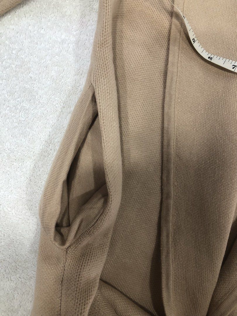 Chicwish Beige Knit Cardigan with Pockets (Category: Coats, Jackets and Outerwear) located in Manila. Submitted by janmichael26601 (Listing ID 1461587177, Image 3). Description: - Beige knit cardigan from Chicwish - Open front style with long sleeves - Features two convenient side pockets - Made of soft 100% acrylic material - Measurements: Chest (laid flat) approx. 22 inches, Length approx. 35 inches - Ideal for effortless layering over any outf