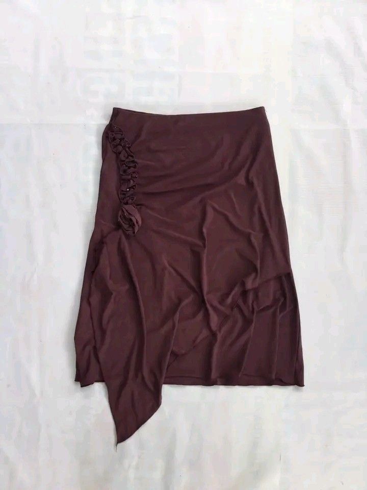 Choco Brown Asymmetrical Midi/Maxi Skirt (Category: Skirts) located in Caloocan City. Submitted by babradede215 (Listing ID 1461623987, Image 1). Description: Waistline : 28-30 Length : 25 Color Rate : 9.9/10.