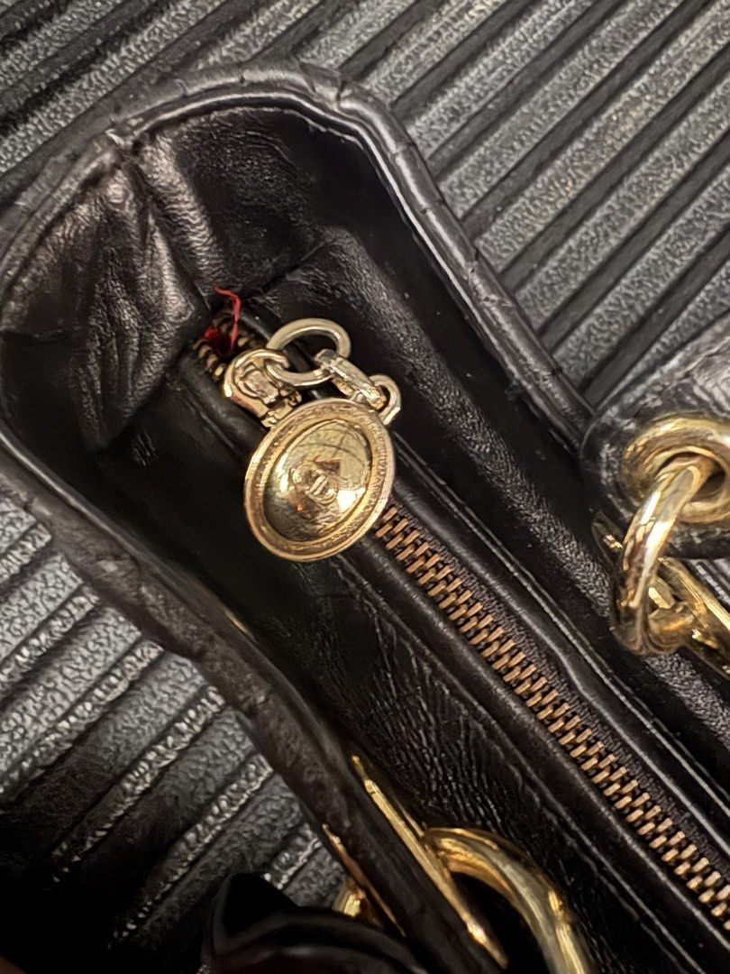 Christian Dior Large Lady Dior (Category: Purses & Pouches) located in Batangas. Submitted by strtdcltrs (Listing ID 1461728657, Image 3). Description: Christian Dior Large Lady Dior in Black NGA OFF FROM CANAL STREET Lambskin leather with Cannage quilting Hardware: Gold-tone Interior: Vibrant red lining featuring the signature Dior monogram pattern, equipped with an interior zippered pocket. .