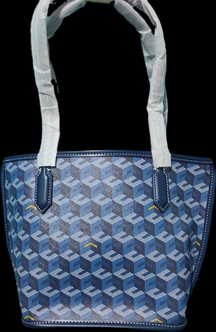 Christy Ng Russo (Category: Shoulder Bags) located in Caloocan City. Submitted by jpmshoppe (Listing ID 1461678174, Image 2). Description: Soft leather Medium Open Tote Available in gray snd blue color.