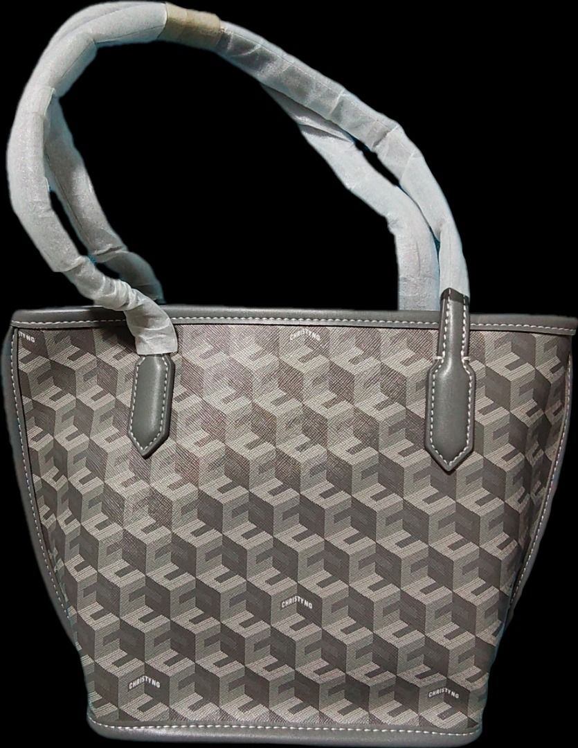 Christy Ng Russo (Category: Shoulder Bags) located in Caloocan City. Submitted by jpmshoppe (Listing ID 1461678174, Image 1). Description: Soft leather Medium Open Tote Available in gray snd blue color.