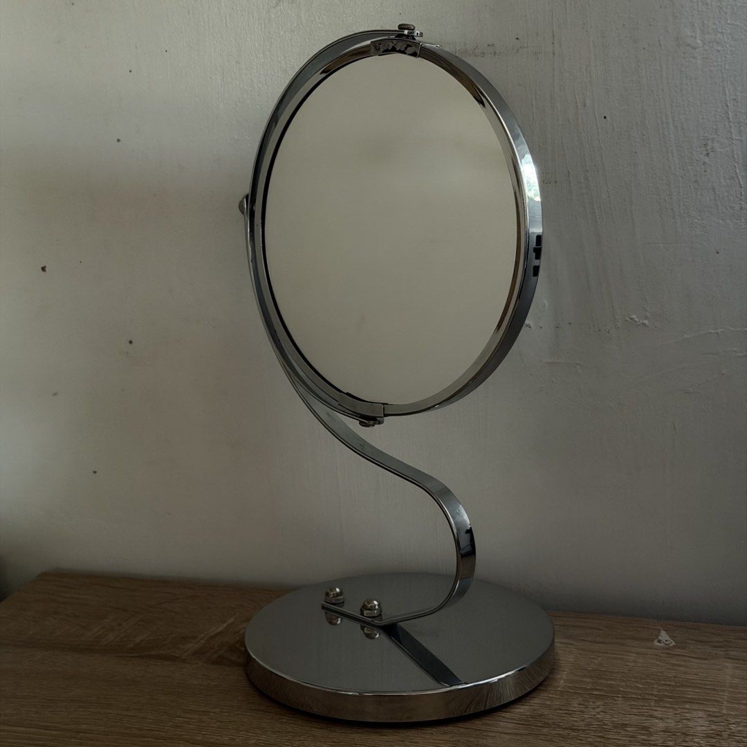 Chrome Swivel Tabletop Mirror (Category: Mirrors) located in Malabon City. Submitted by immaneedspace (Listing ID 1461626646, Image 1). Description: - Chrome tabletop mirror - Swivels for easy adjustment - Round, weighted base for stability - Perfect for makeup application and grooming - Minor marks on mirror surface.