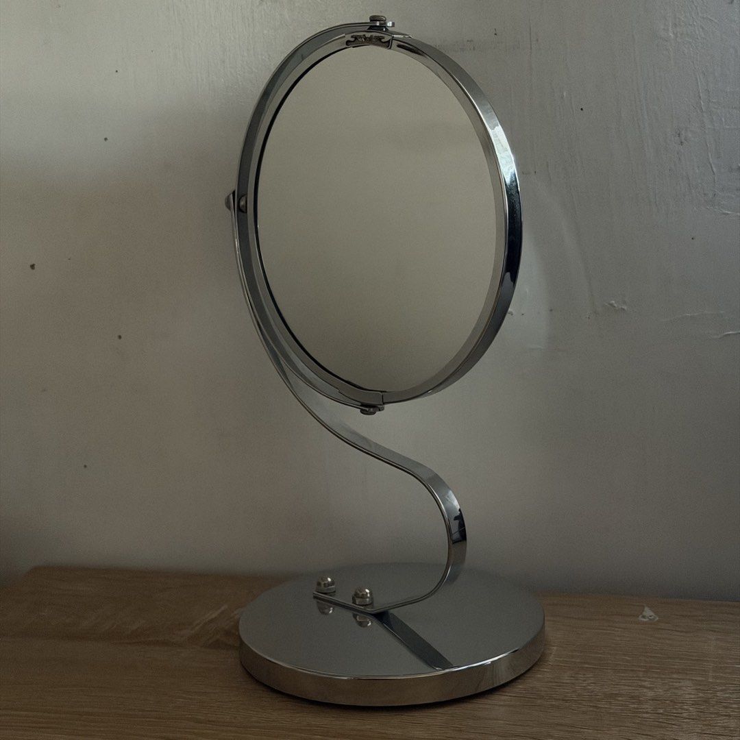 Chrome Swivel Tabletop Mirror (Category: Mirrors) located in Malabon City. Submitted by immaneedspace (Listing ID 1461626646, Image 3). Description: - Chrome tabletop mirror - Swivels for easy adjustment - Round, weighted base for stability - Perfect for makeup application and grooming - Minor marks on mirror surface.