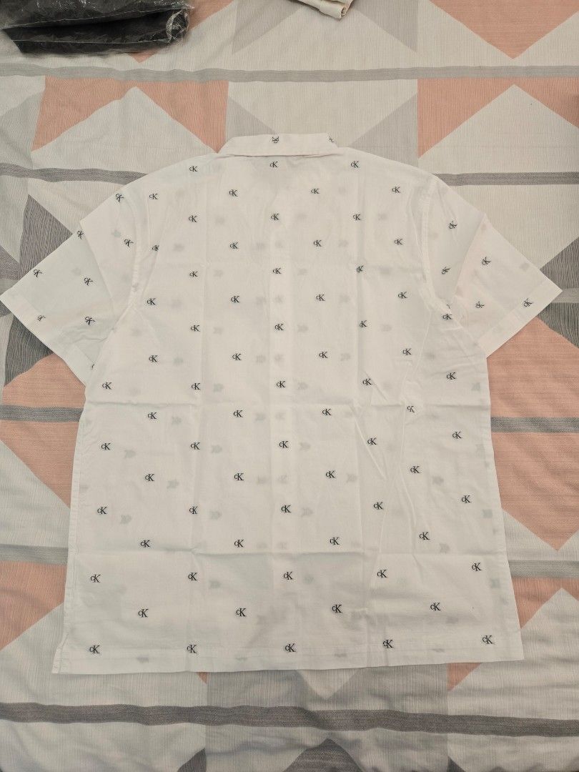 CK calvin klein polo shirt white (Category: Tshirts & Polo Shirts ) located in Manila. Submitted by chocomoose (Listing ID 1461585779, Image 3). Description: bnew size medium.