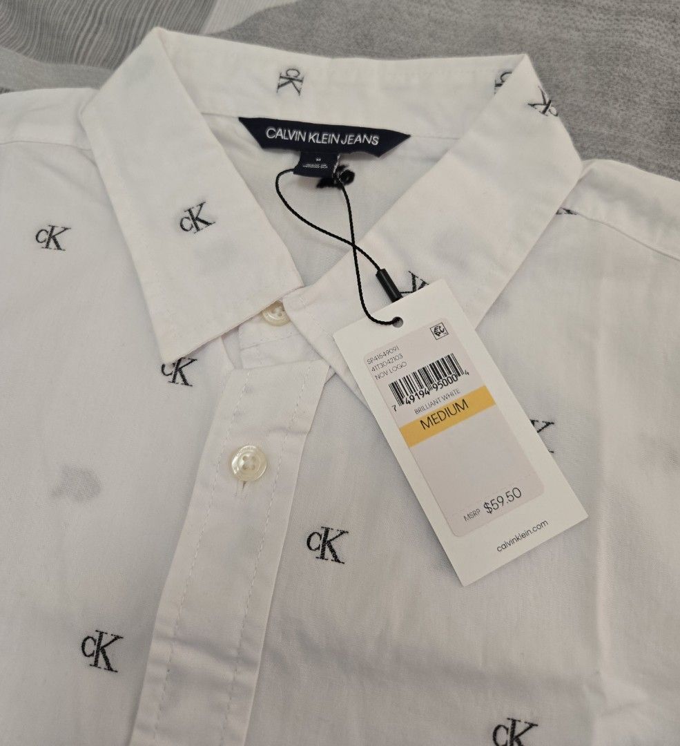 CK calvin klein polo shirt white (Category: Tshirts & Polo Shirts ) located in Manila. Submitted by chocomoose (Listing ID 1461585779, Image 2). Description: bnew size medium.