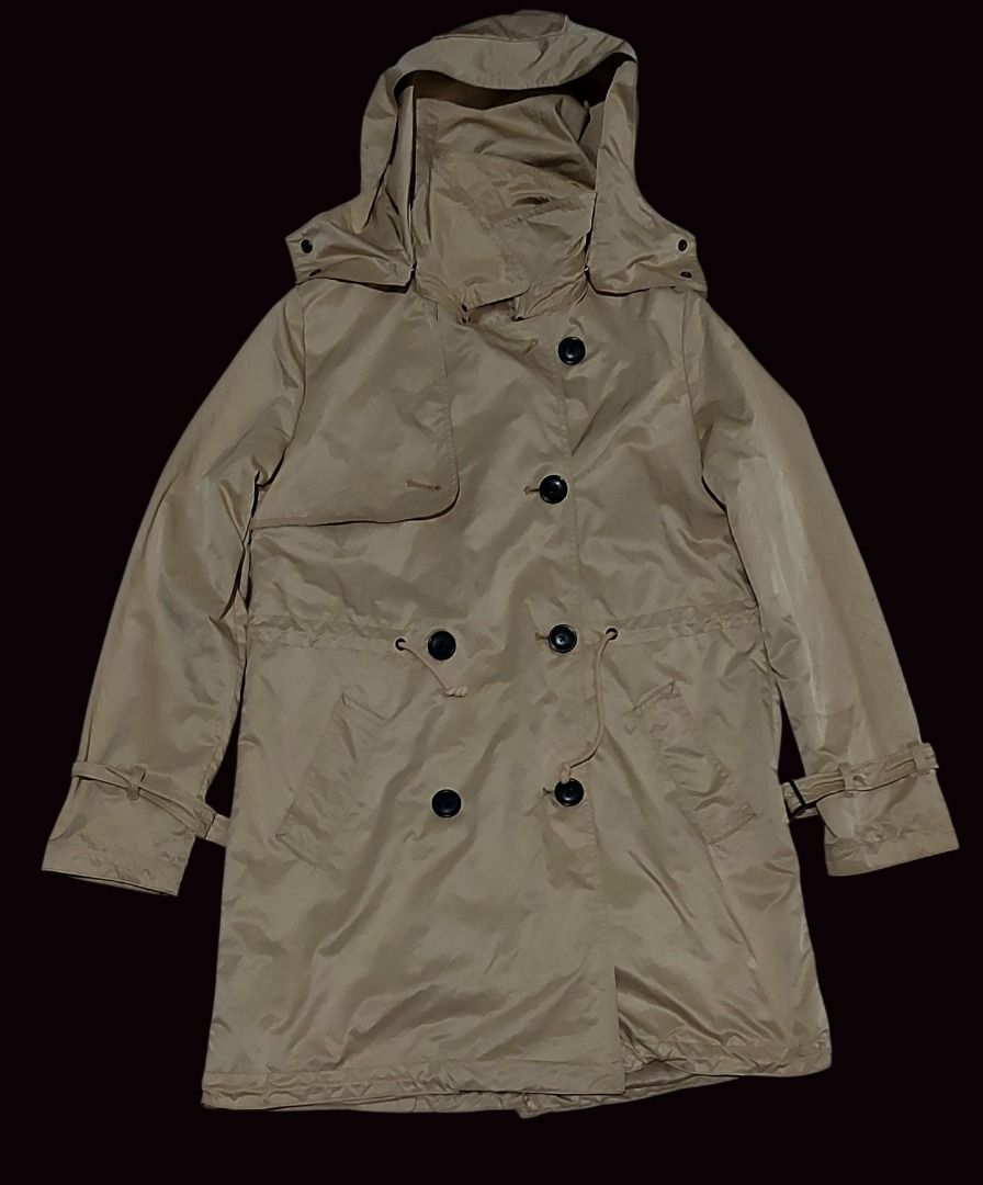 Classic Gap Utility Hooded Trench Coat (Category: Coats, Jackets and Outerwear) located in Baguio. Submitted by pure_vntg53 (Listing ID 1461720731, Image 1). Description: GAP(Authentic Indonesian import) Material: Heavy-duty, water resistant tech shell with a smooth inner lining( 58% polyester, 42% nylon). Features: Removable hood, adjustable cinched drawstring waist, asymmetrical gun flap and unique tied cuff details. Measurements: Pit-pit: 18.5