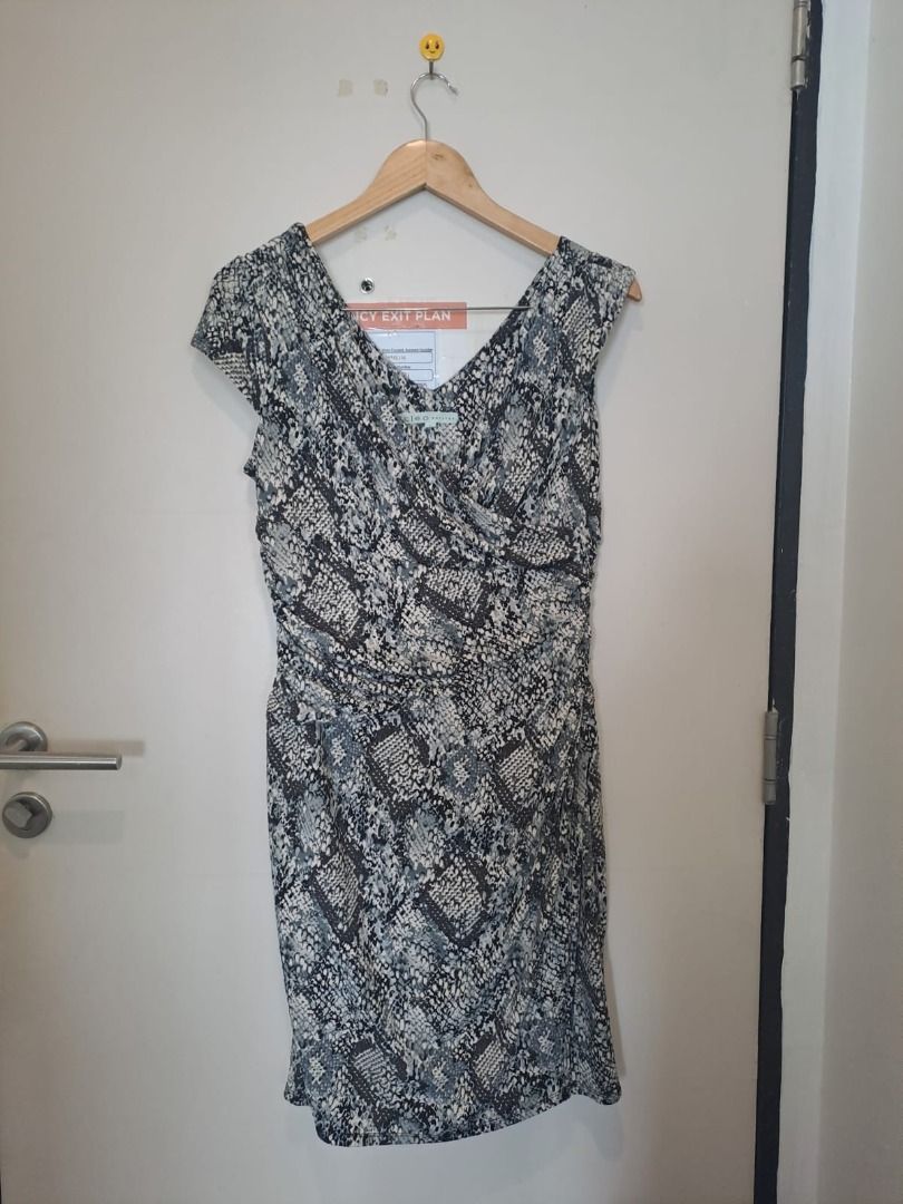 cleo petite python dress (Category: Dresses) located in Mandaluyong City. Submitted by epicowl-c93c (Listing ID 1461768605, Image 1). Description: The image shows a grey and black snakeskin python print faux wrap dress from the brand Cleo Petites. It features a V-neckline, cap sleeves, a gathered draped front, and side ruching..