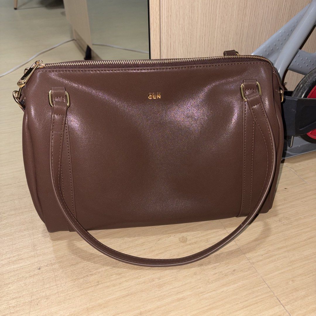 CLN Brown Leather Handbag (Category: Luxury Bags & Wallets) located in Iloilo. Submitted by nana_osaki07071999 (Listing ID 1461657203, Image 2). Description: - Brand: CLN - Material: Brown Leather - Closure: Zip - Interior: 1 zip pocket, 1 smaller pouch - Hardware: Gold details - Strap: Detachable - Ideal for: Everyday use.