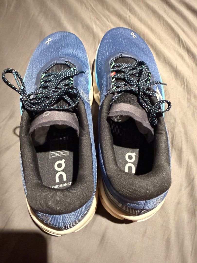 Cloudmaster (Category: Sneakers) located in Kuala Lumpur. Submitted by soredekita (Listing ID 1461761582, Image 3). Description: On Cloudmonster running shoes, featuring a deep blue mesh upper and a distinct chunky tan sole. Preloved No box Meet up Ampang Park.