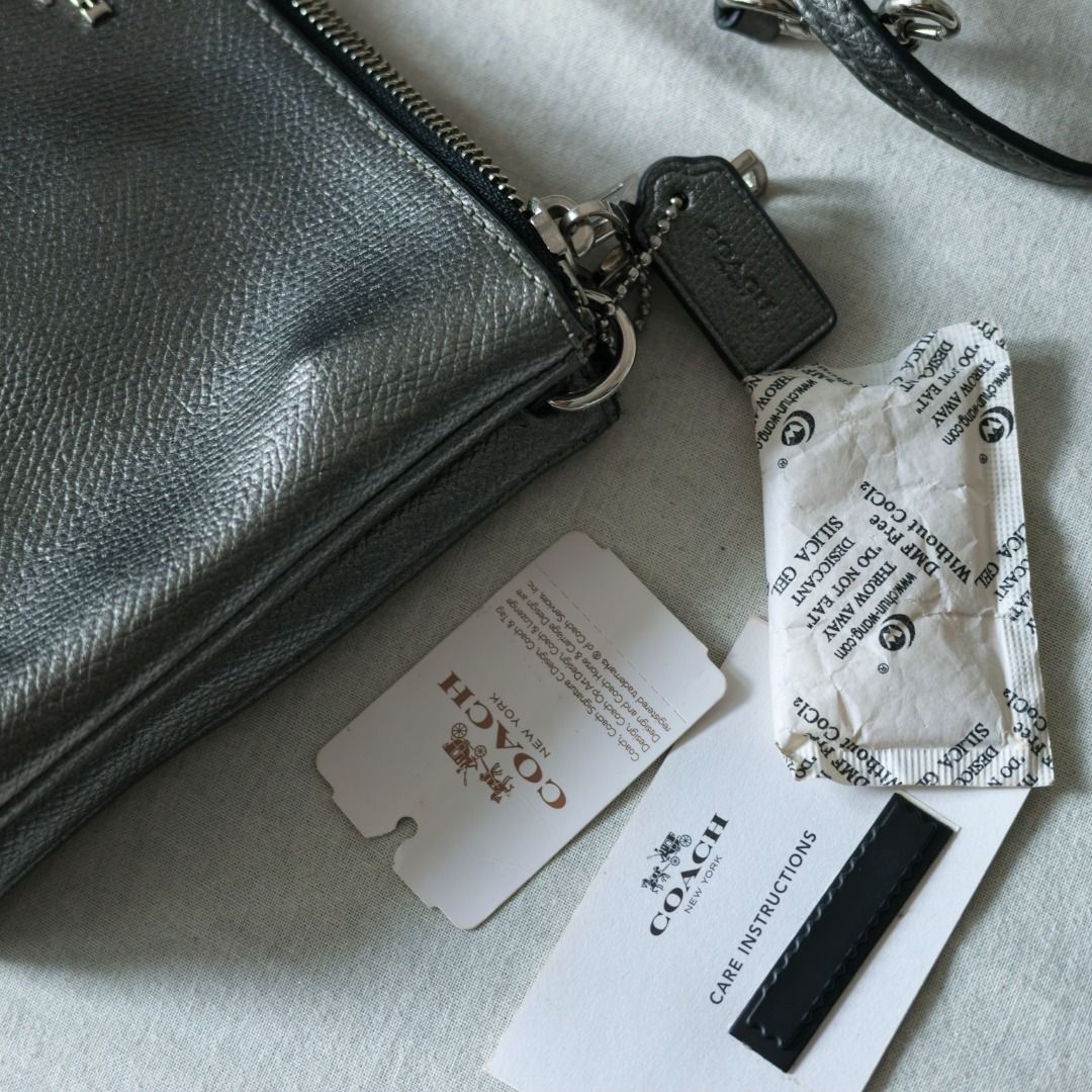 Coach | Metallic Crossbody Bag with Strap (Category: Cross-body Bags) located in Taguig. Submitted by tureesha (Listing ID 1461693572, Image 2). Description: RFS: Decluttering 📌 PLEASE READ BEFORE SENDING AN OFFER 📸 CONDITION • As described and shown in photos. Please review all photos and the description before offering. Feel free to ask for more photos or details, happy to send. ✅ ALL SALES ARE FINAL • No returns or refunds once handed over. 