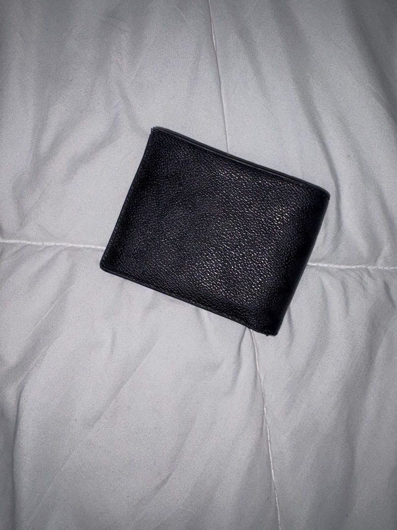 COACH Men’s Black Bifold Wallet (Category: Wallets & Card holders) located in Manila. Submitted by weararchive.mnl (Listing ID 1461747897, Image 2). Description: FIXED PRICE Preloved, good condition 🖤 • Genuine COACH • Black leather • Multiple card slots + bill compartment • Approx. 11 × 9 cm.