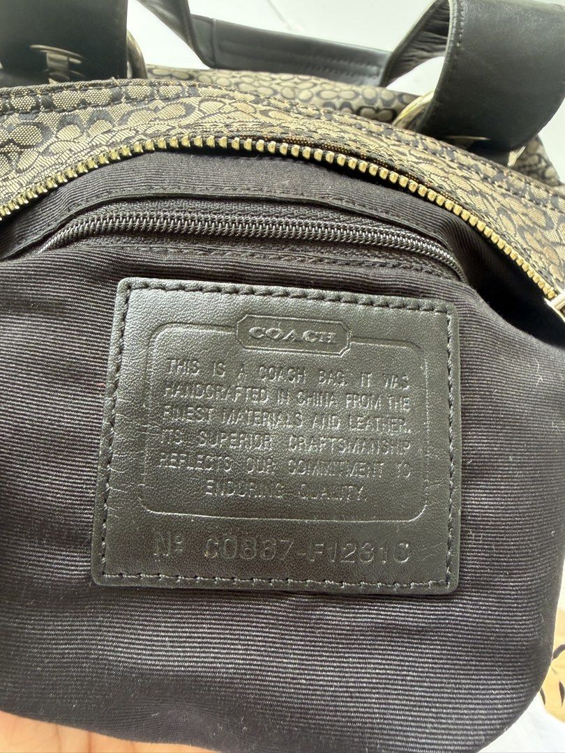 Coach Monogram Canvas Leather Trim Shoulder Bag (Category: Other Bottoms) located in Dumalag. Submitted by pili.ph (Listing ID 1461751376, Image 2). Description: - Classic Coach monogram shoulder bag - Black leather trim and handles - Zipper closure for main compartment - Interior zip pocket and slip pockets - Comes with Coach leather hangtag - Great everyday bag.