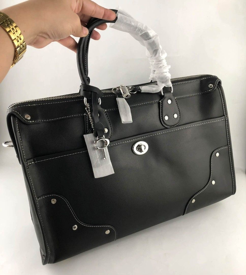 Coach Rhyder Large in Black (Category: Shoulder Bags) located in Quezon City. Submitted by bagsboutiqueph (Listing ID 1461727331, Image 1). Description: LAST PRICE POSTED. LIMITED STOCKS! BRANDNEW WITH INCLUSIONS. COLOR MAY SLIGHTLY VARY IN ACTUAL DUE TO LIGHTING AND CAMERA SETTING. OTHER PHOTOS WILL BE SEND DURING PURCHASE AND FOR SURE BUYERS ONLY. WHEN IN DOUBT, DO NOT ORDER. THANK YOU..
