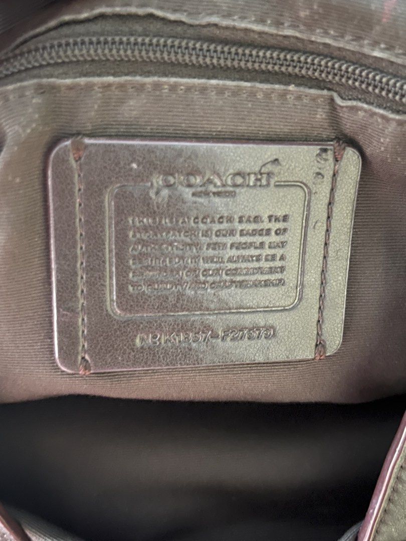Coach Signature Canvas Leather Shoulder Bag (Category: Luxury Bags & Wallets) located in Quezon City. Submitted by kikays0215 (Listing ID 1461714564, Image 3). Description: - Classic Coach shoulder bag - Signature canvas with dark blue leather trim - Gold hardware details - Interior zip pocket and slip pockets - Spacious interior - Great everyday bag.