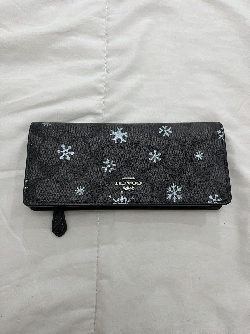 Coach Signature Snowflakes Wallet (Category: Wallets & Card holders) located in Cavite. Submitted by inbetweenmarket (Listing ID 1461793701, Image 1). Description: Original coach wallet Brand new, without box .