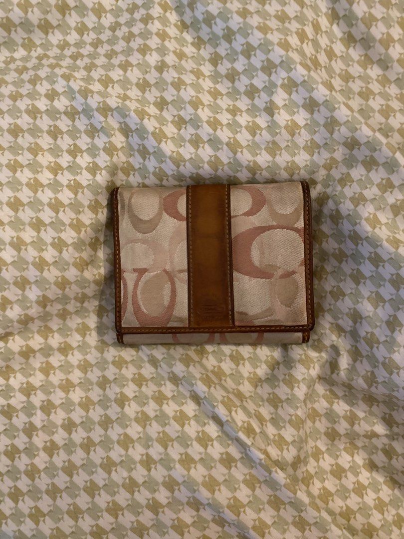 COACH soho optic pink wallet (Category: Luxury Bags & Wallets) located in Davao. Submitted by honeycales81780 (Listing ID 1461685618, Image 2). Description: ⭐️ RARE! Coach soho optic pink wallet ⭐️ PHP 1400 ⭐️ Authentic ⭐️ Inside is clean and well-kept except for the watermarks ⭐️ Zippers and hardware fully working ⭐️ Great for daily use or vintage styling ⭐️ MOP: GCash ⭐️ MOD: Jnt ⭐️ Helping tags: coach vintage pink bag pink bag coach bag leathe