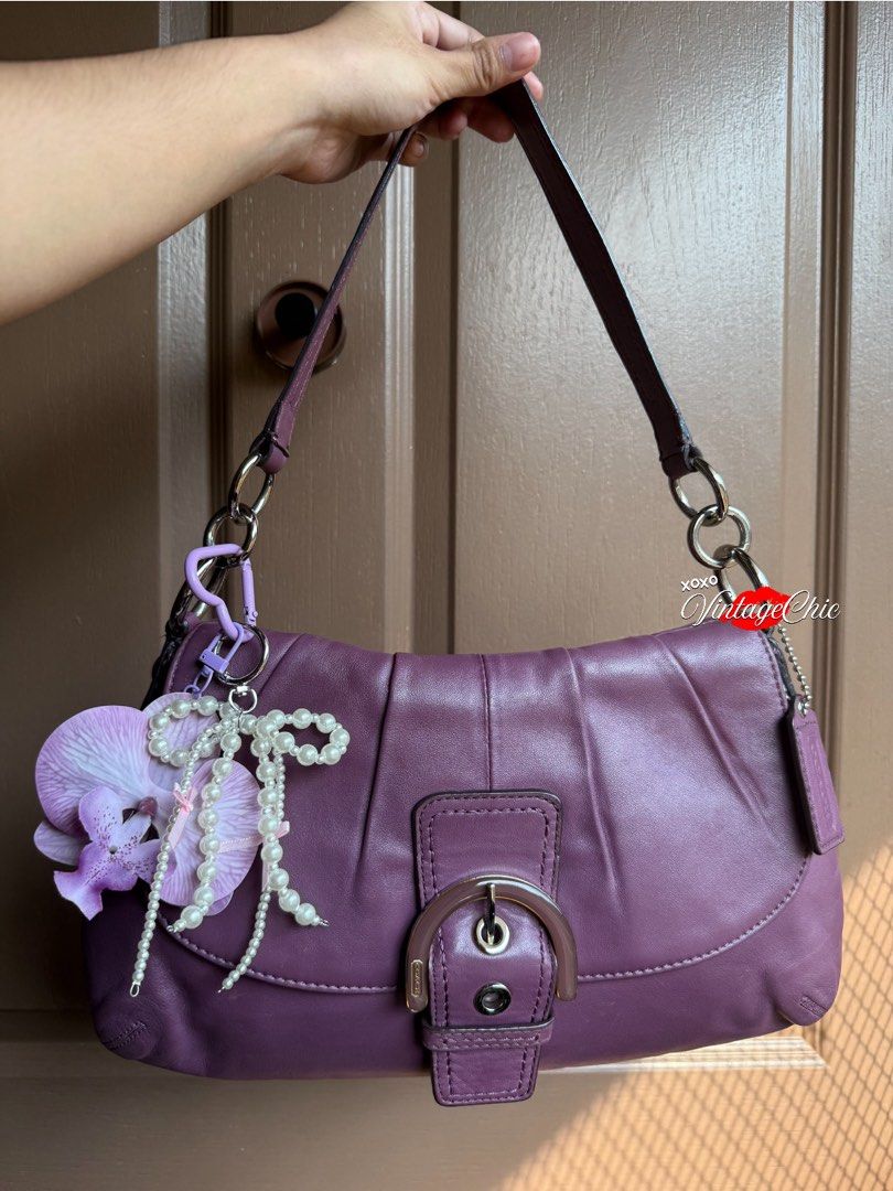 Coach Vintage Soho (Category: Shoulder Bags) located in Taguig. Submitted by xoxovintagechic (Listing ID 1452276778, Image 1). Description: This bag is turning 15 years old 💜 Charm is included Medium size spacious good condition Price drop from 9.5k PLEASE LOOK CAREFULLY AT ALL PHOTOS AS THEY ARE PART OF THE DESCRIPTION..