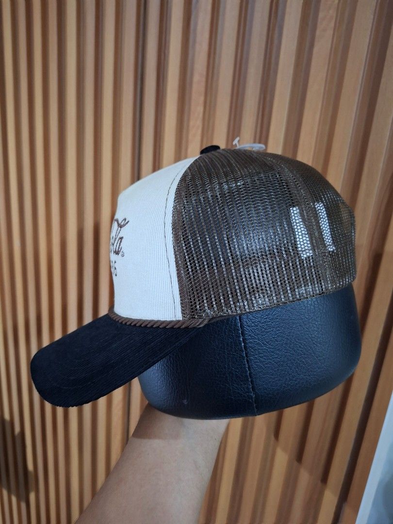 Coca-Cola "Since 1886" Trucker Cap (Category: Caps & Hats) located in Cebu City. Submitted by anton_delos_reyes (Listing ID 1461596988, Image 2). Description: - Classic Coca-Cola cap - Embroidered 'Drink Coca-Cola Since 1886' logo on front - White corduroy front panel - Black corduroy sides and brim - Breathable mesh back - Adjustable snapback closure - Ideal for Coca-Cola fans and collectors.