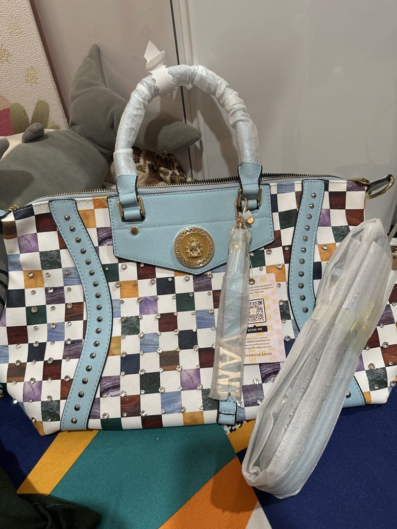 Colorful Studded Checkered Handbag/Sling Bag (Category: Shoulder Bags) located in Caloocan City. Submitted by lavenshaven (Listing ID 1461699213, Image 2). Description: -Item was never used. -No dustbag or box -Sling and handles are still covered -Brand: Fermoza -Location: North Caloocan.