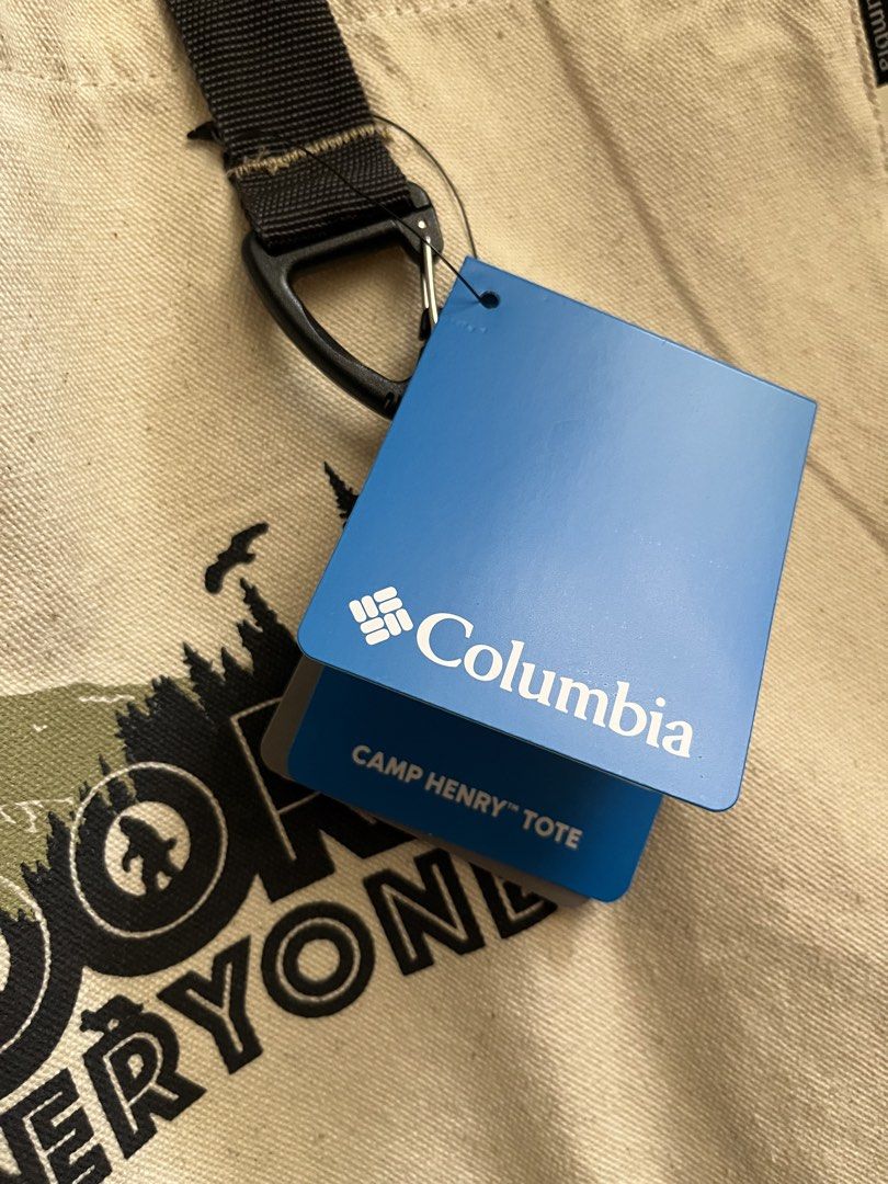 Columbia Camp Henry Tote Bag (Category: Tote Bags) located in Calapan. Submitted by shakalak (Listing ID 1461710833, Image 3). Description: - Brand: Columbia - Design: "Outdoor is Forever Everyone" graphic -Size L-18/H 11/W 4 - Material: Durable canvas - Features: Internal mesh pocket - Condition: Brand new with original tags attached - Ideal for: Outdoor adventures, everyday essentials.