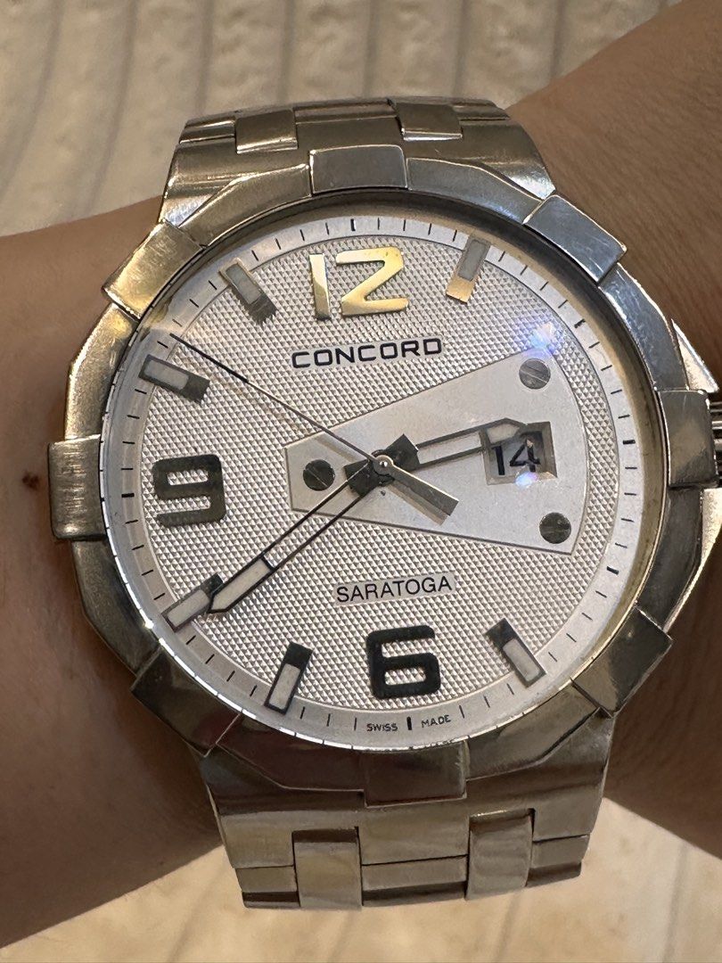 Concord Saratoga (Category: Luxury Watches) located in Pasig City. Submitted by surplusatbp (Listing ID 1461570040, Image 2). Description: Concord Saratoga Luxury Sport Watch Description: Premium Swiss-made luxury sport watch from Concord’s iconic Saratoga line, defined by its signature sculpted bezel design and sophisticated textured dial architecture. Case Size: 40 mm | Wrist Size: Fits up to 16.5 cm Features & Selling Points: * Distinctive sil