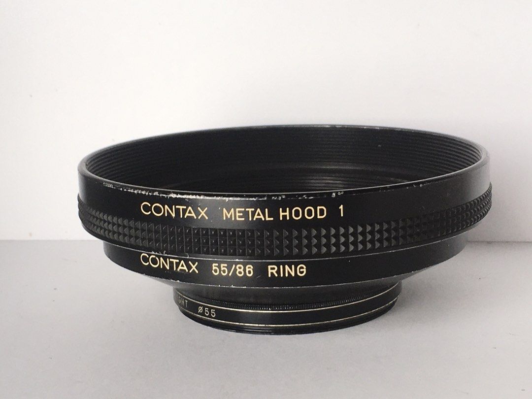 Contax metal hood with step ring (Category: Lens & Kits) located in Las Pinas. Submitted by film101 (Listing ID 1461576939, Image 1). Description: Contax metal hood plus step up ring Use for C/Y mount lens with 55mm bottom thread Contax metal hood 1 Contax 55/86 metal ring step up ring.