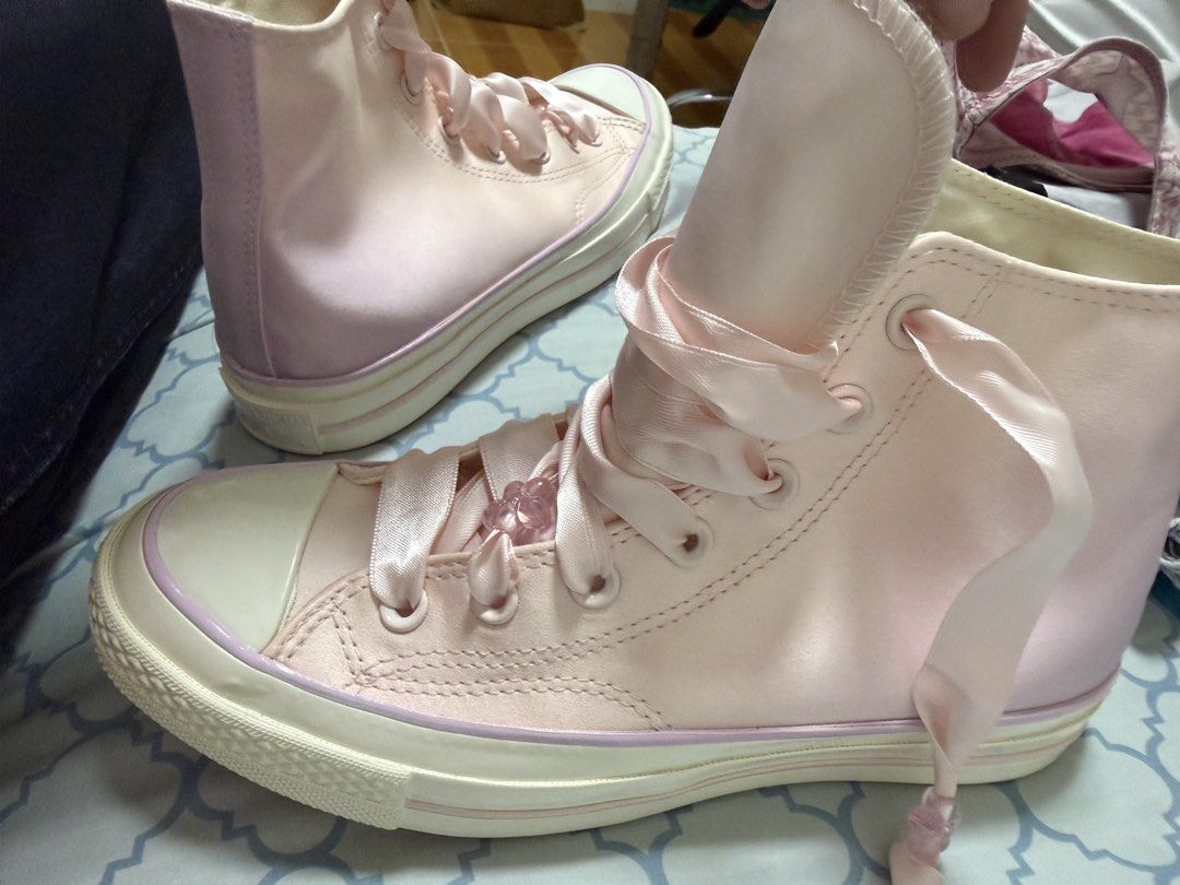 Converse Chuck Taylor All Star High Top Pink Satin Ribbon (Category: Sneakers) located in Manila. Submitted by lushfashionph (Listing ID 1461573708, Image 2). Description: - Brand new Pink Satin Converse High Tops - Features: Ribbon laces and cute flower details - Condition: Never worn, still has original tags - RFS: Received it as a gift but it is not my style .