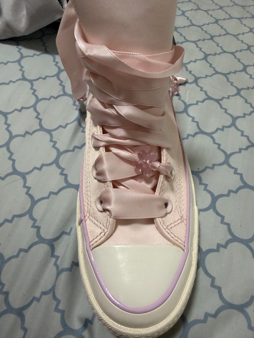 Converse Chuck Taylor All Star High Top Pink Satin Ribbon (Category: Sneakers) located in Manila. Submitted by lushfashionph (Listing ID 1461573708, Image 3). Description: - Brand new Pink Satin Converse High Tops - Features: Ribbon laces and cute flower details - Condition: Never worn, still has original tags - RFS: Received it as a gift but it is not my style .