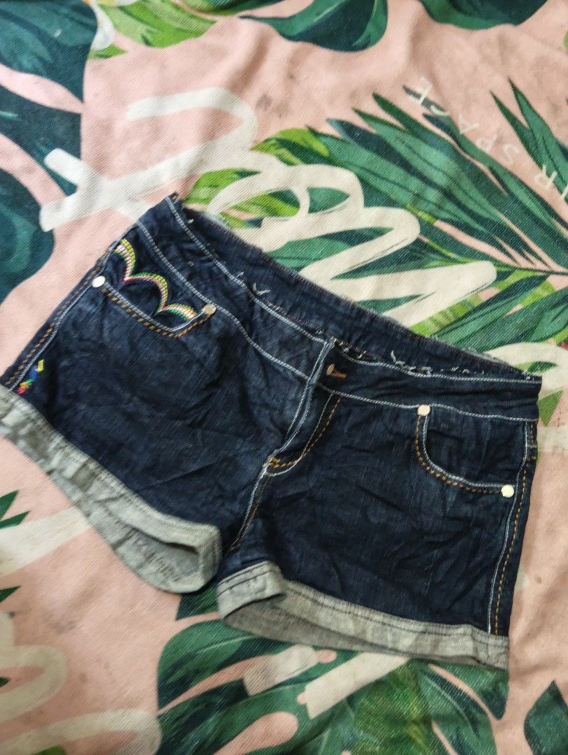 Coogi Denim Shorts with Embroidered Logo (Category: Shorts) located in Davao. Submitted by noelamihan05424 (Listing ID 1461567529, Image 2). Description: - Iconic embroidered Coogi logo on back pockets - Comfortable cotton and spandex blend - Stylish cuffed hem detail - Ideal for everyday casual wear - Waist 34 - Length 10 inches - No issue .