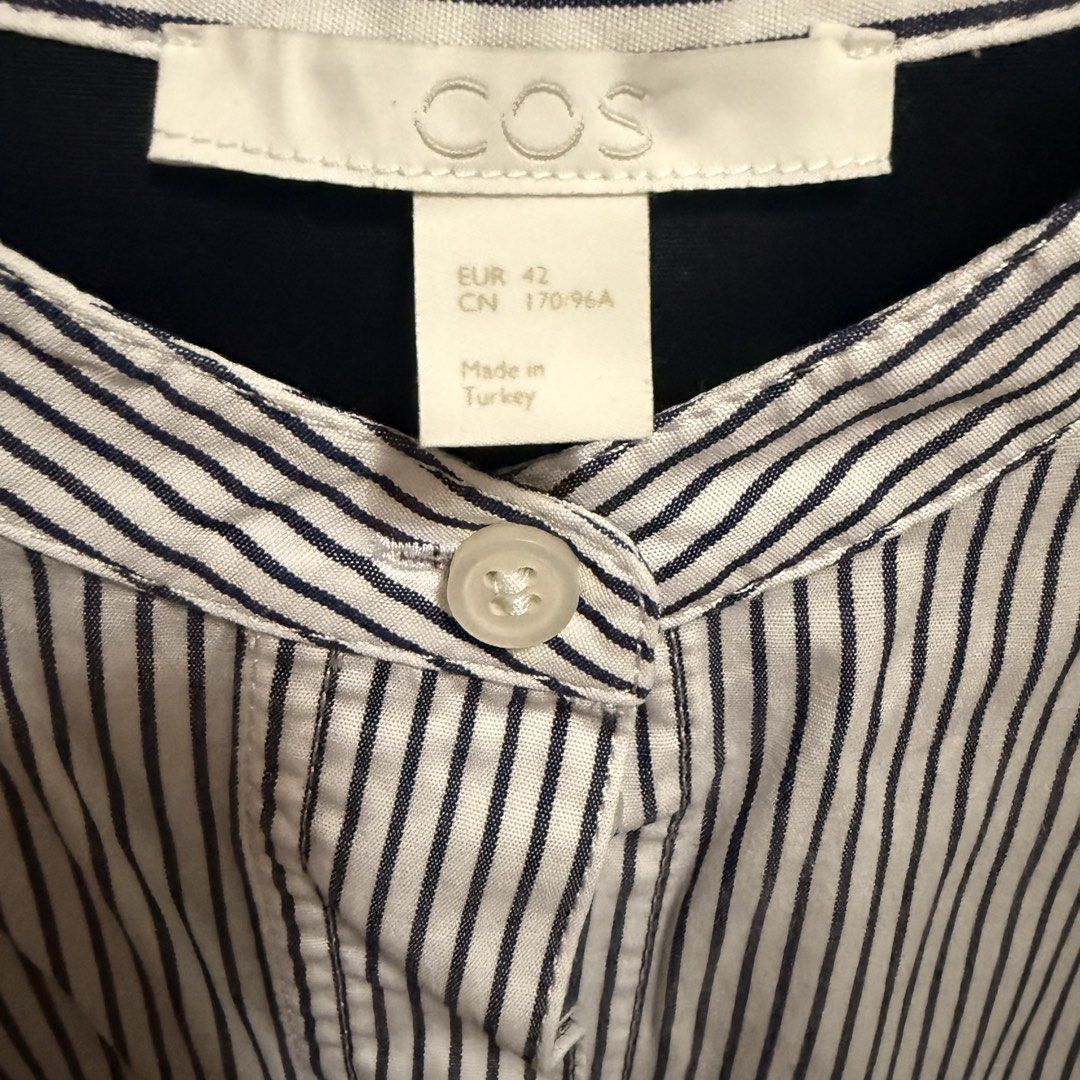 COS Striped Shirt with Blue Patch Detail (Category: Longsleeves) located in Paranaque City. Submitted by prelovednibianca (Listing ID 1461705685, Image 3). Description: - COS Long-Sleeved Shirt - Classic pinstripe pattern - Dark blue patch on left chest - Dark blue panel on the back - Mandarin collar with button closure - Size: EUR 42 📍 Item will be coming from PARAÑAQUE. 📦 Delivery via Lalamove or J&T. ⏰ Next-day pickup cutoff is 10:30PM. ✔️ D