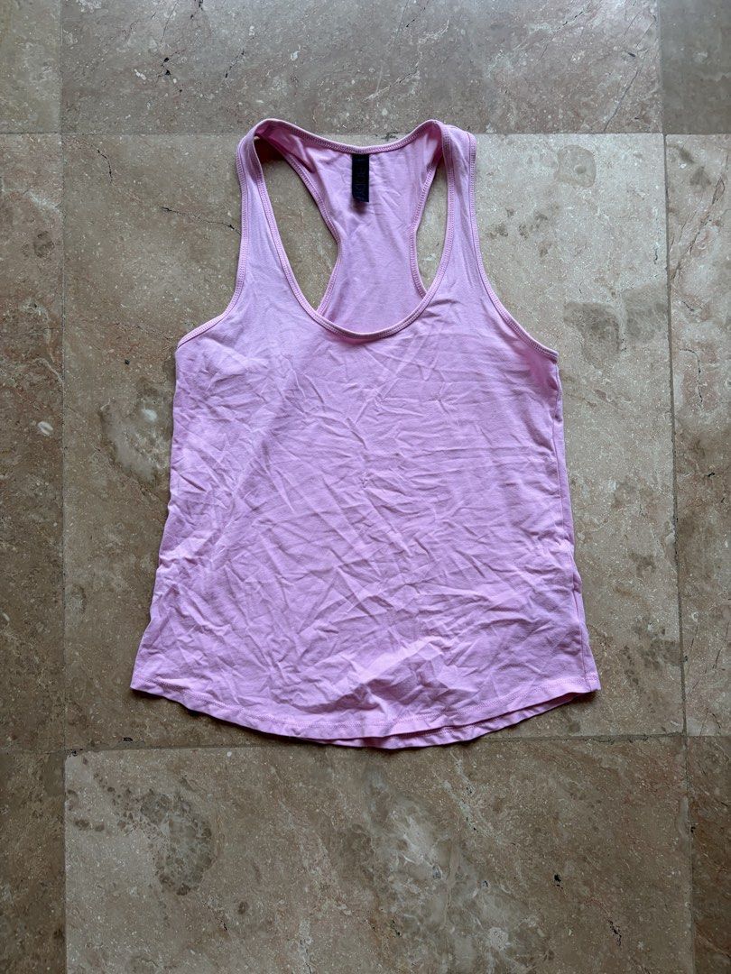 Cotton On Racerback Top, Pink (Category: Sleeveless) located in Quezon City. Submitted by tidyup.lara (Listing ID 1461568837, Image 1). Description: Size XS Bust 30” Waist 33” Length 25” Condition 8/10: used but in good condition .