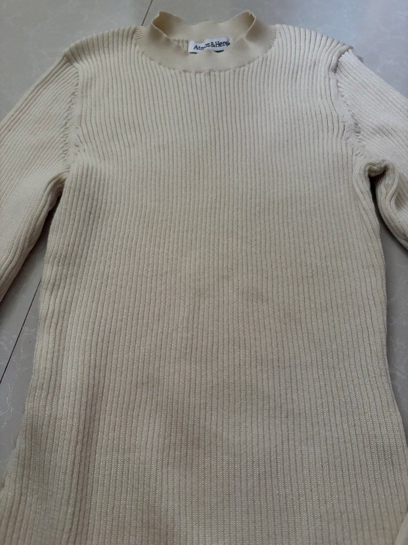 Cream knit sweater (Category: Longsleeves) located in Las Pinas. Submitted by bibliomomma (Listing ID 1461657922, Image 3). Description: Cream ribbed knit sweater from Atmos&Here. Soft and stretchy material with a simple fitted design, perfect for layering when traveling out of the country MOP Gcash.