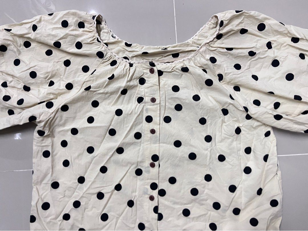 Cream Polka Dot Puff Sleeve Top (Category: Blouses) located in Manila. Submitted by sossa4 (Listing ID 1461713251, Image 3). Description: - Cream top with chic black polka dots - Features stylish puff sleeves with delicate lace trim - Convenient button-up front - size: medium-large .