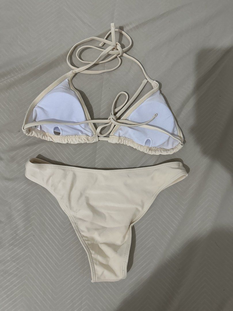Cream Triangle Bikini Set (Category: Bikinis & Swimsuits) located in Lipa City. Submitted by chiechums (Listing ID 1461569045, Image 2). Description: - Cream colored bikini set - Triangle top with adjustable tie straps - Matching bikini bottoms - Ideal for beach or pool - Simple and classic design.
