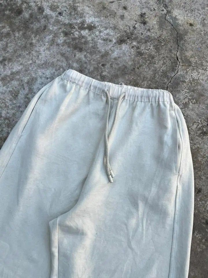 Cream Wide Leg Drawstring Pants (Category: Activewear) located in Trece Martires City. Submitted by jhaaamess (Listing ID 1461706214, Image 3). Description: - Cream colored wide-leg pants - Elastic waistband with adjustable drawstring - Side pockets and one back pocket - Comfortable and casual design - Perfect for everyday wear.