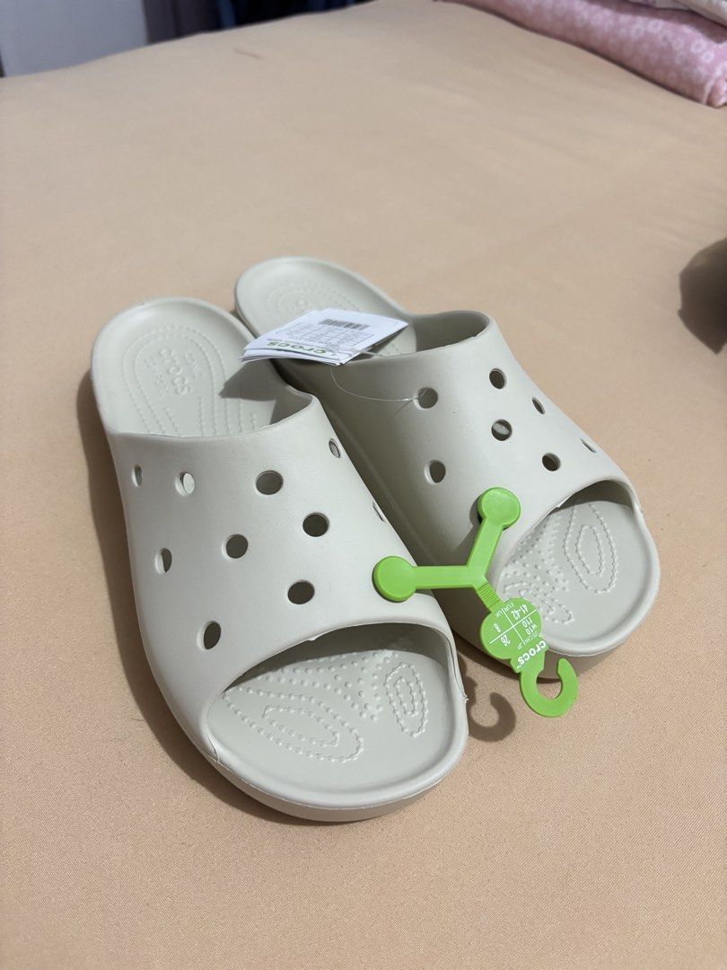 Crocs Classic Platform Slides Bone W10 (Category: Slippers and slides) located in Lucban. Submitted by quinsdollhouse (Listing ID 1461668020, Image 1). Description: - Crocs Classic Platform Slides - Color: Bone - Size: Women's 10 (W10) - Super comfortable and easy to slip on - Ideal for everyday wear - Comes with original tags.