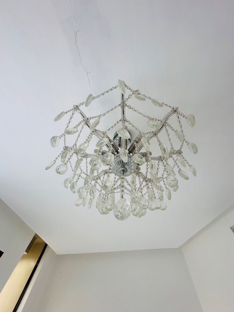 Crystal Chandelier Ceiling Light Fixture (Category: Lighting) located in Davao. Submitted by emmabasoc (Listing ID 1461583864, Image 1). Description: - Beautiful crystal chandelier for your ceiling. - Features numerous sparkling glass droplets. - Instantly adds a touch of glamour to any room. - Simple and easy installation process. - Fully functional and in good working condition..