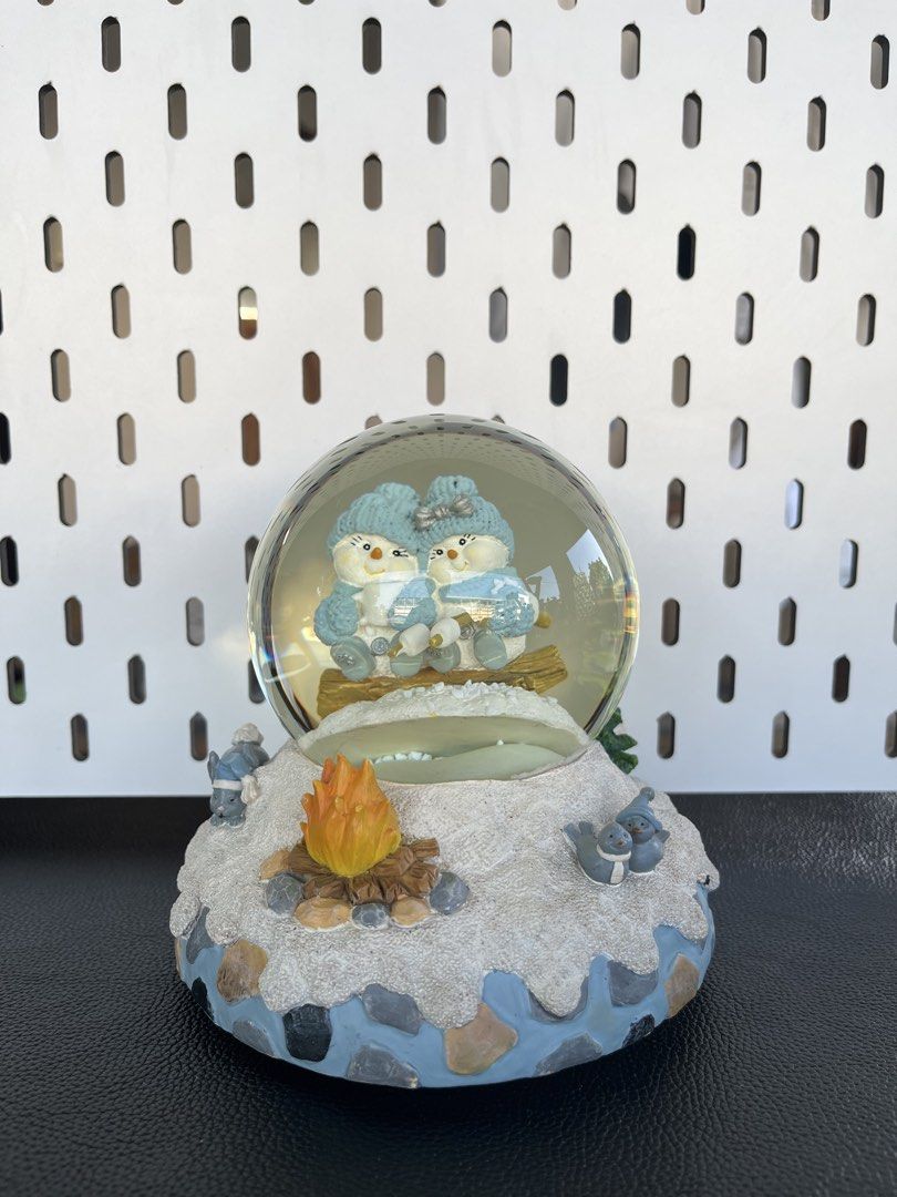 Cute Snow Globe with Two Snowmen and Campfire Scene (Category: Vintage Collectibles) located in Quezon City. Submitted by mickieslittlecorner (Listing ID 1461734082, Image 1). Description: - Adorable snow globe with two snuggled snowmen. - Filled with magical snowfall effect when shaken. - Ideal for winter decoration or as a thoughtful gift..
