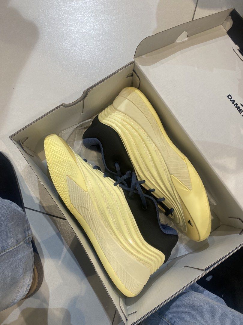 DAME 10 ALMOST YELLOW (Category: Sneakers) located in Manila. Submitted by cryptoknig57639 (Listing ID 1461660174, Image 1). Description: - Adidas Dame 10 “Dame Time" basketball shoes - Color: Yellow and Black - Unique wavy sole design for performance - Comes with original box - Perfect for players seeking style and court-ready performance.