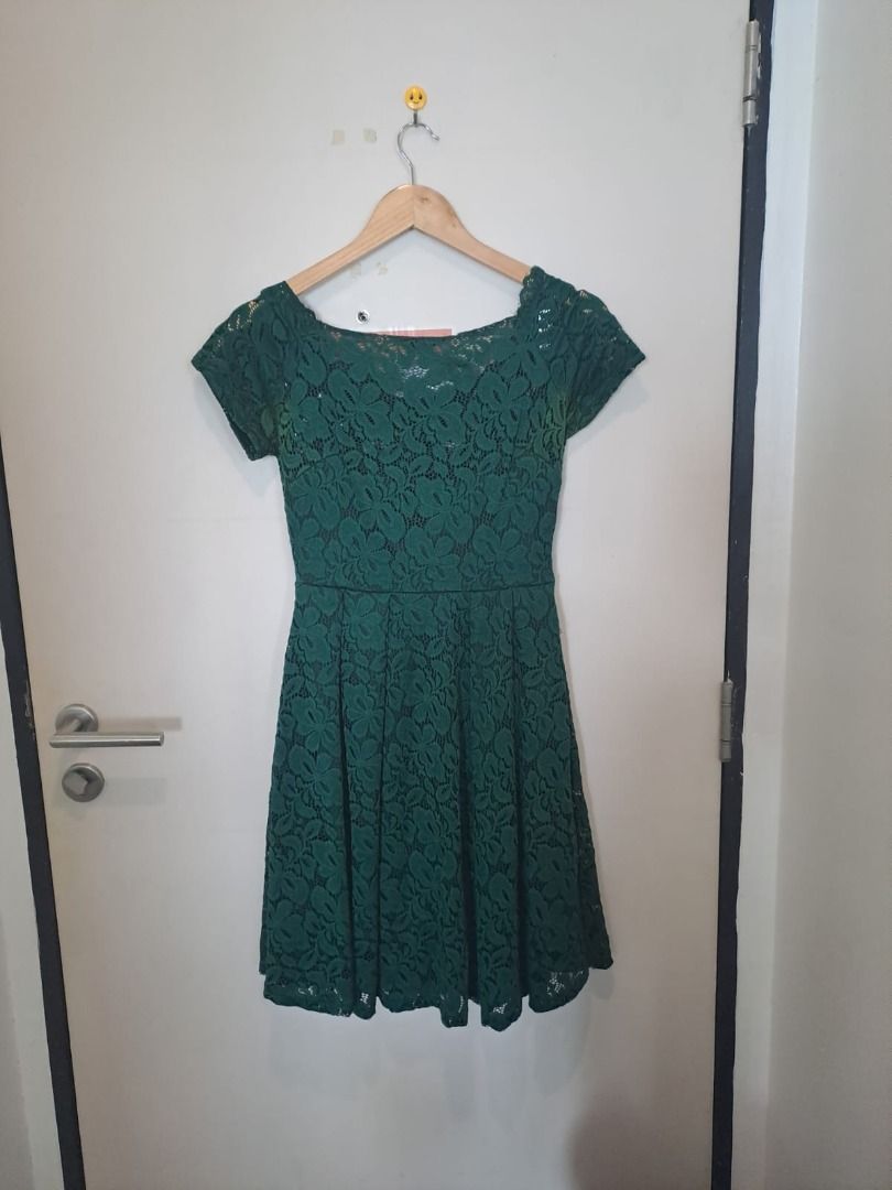 dark green lace dress (Category: Dresses) located in Mandaluyong City. Submitted by epicowl-c93c (Listing ID 1461768090, Image 2). Description: The image shows a dark green floral lace dress featuring a brand tag that reads "Missmay"..