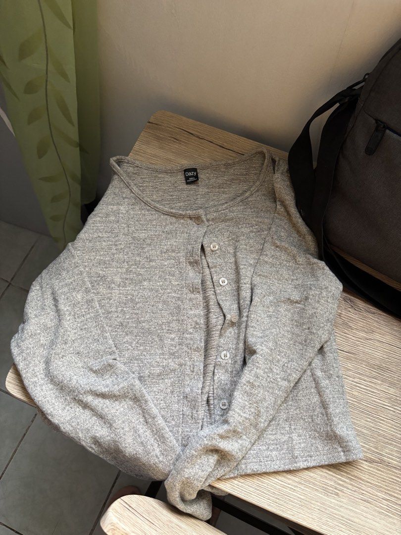 Dazy Grey Button-Up Long Sleeve Cardigan Size S (Category: Longsleeves) located in Quezon City. Submitted by notkyla (Listing ID 1461725368, Image 2). Description: - Grey knit cardigan from Dazy - Long sleeves - Button-up front - Cropped length (waist-hitting) - Soft and comfortable material - Ideal for layering over tops - Originally bought for PHP 337 - Model is 4’11, 29in bust - RFS: too big.