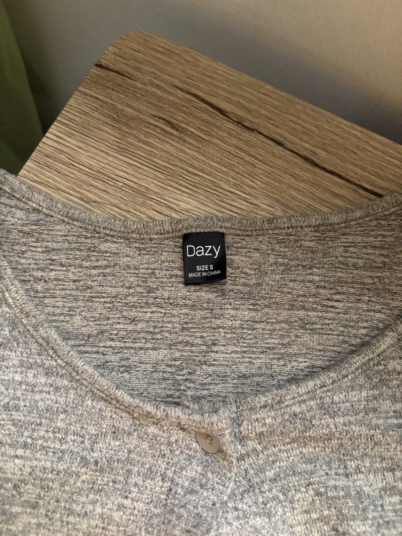 Dazy Grey Button-Up Long Sleeve Cardigan Size S (Category: Longsleeves) located in Quezon City. Submitted by notkyla (Listing ID 1461725368, Image 3). Description: - Grey knit cardigan from Dazy - Long sleeves - Button-up front - Cropped length (waist-hitting) - Soft and comfortable material - Ideal for layering over tops - Originally bought for PHP 337 - Model is 4’11, 29in bust - RFS: too big.